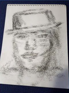 Spirit Art charcoal drawing by Eileen of a man wearing a fedora hat